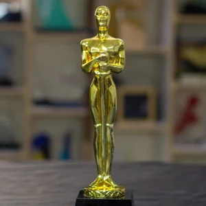 Gold Achievement Statuette on Black Pedestal Base