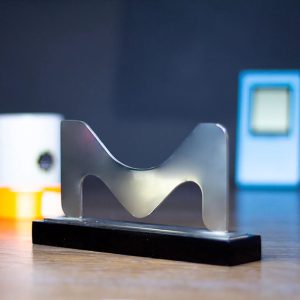 Modern M-Shape Silver Metal Award with Sleek Black Base